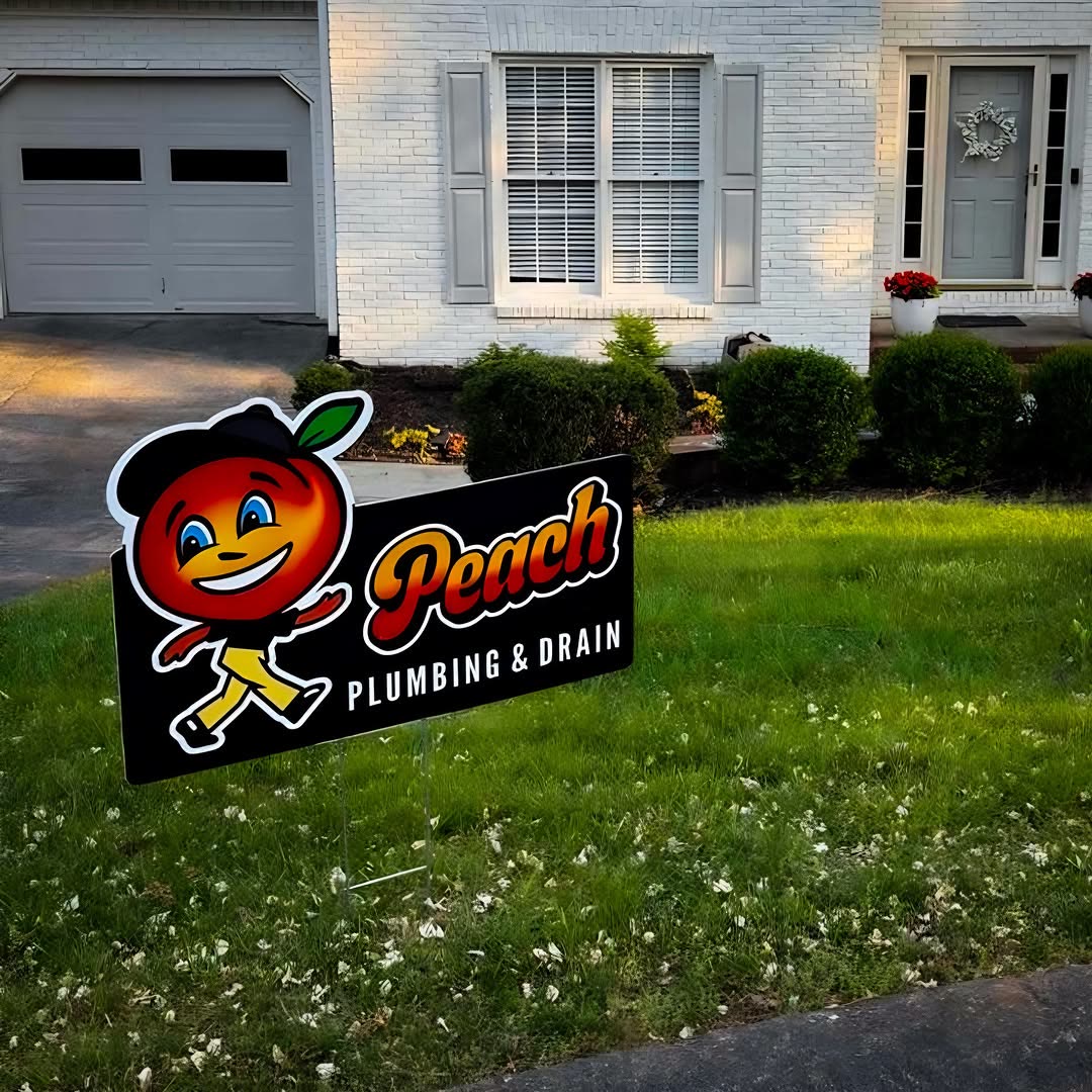 Peach Plumbing yard sign at an Atlanta home
